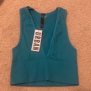 New out from under seamless urban tank size small. In perfect condition.